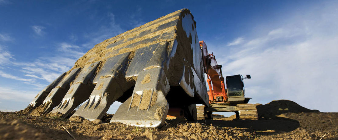 big excavator shovel in the front